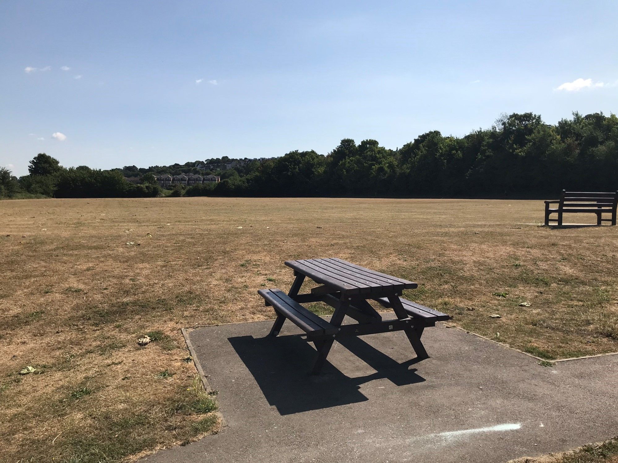 Picnic table looking over one of the large playing fields at Borstal Recreation ground