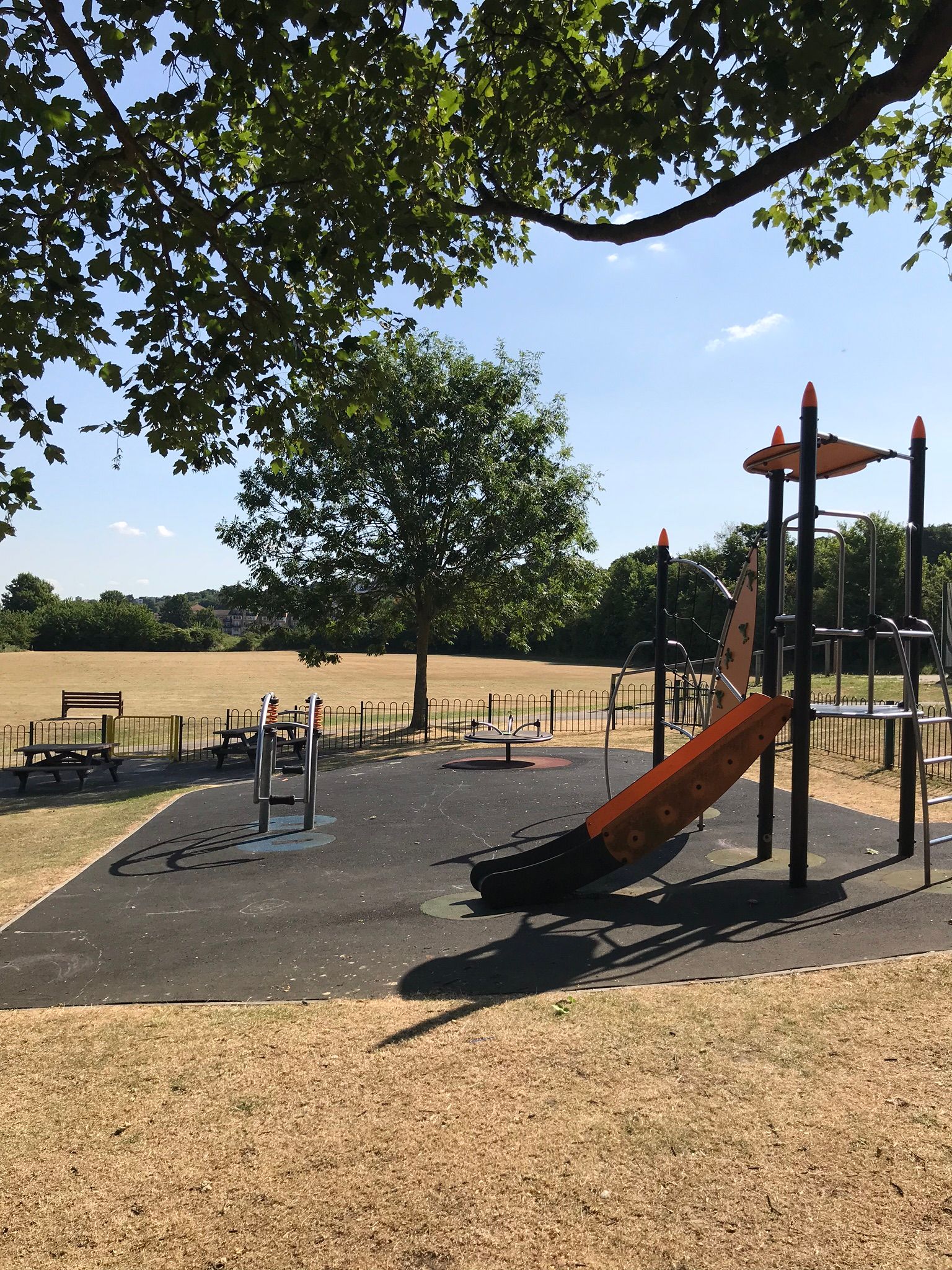 Older children's play equipment at Borstal recreation ground; climbing frame, round-a-bout and springy see-saw