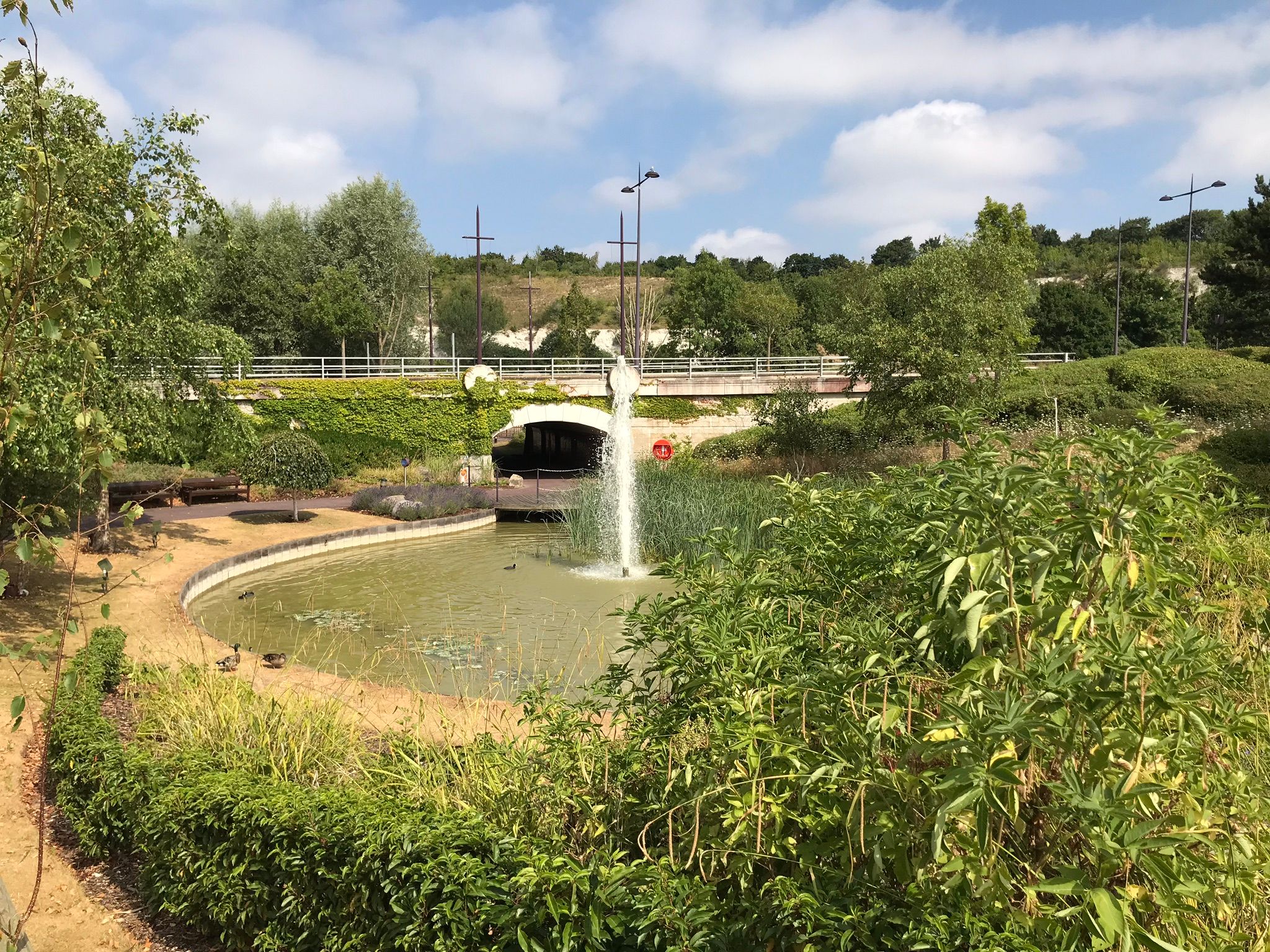 The fountain and mosaic tunnel as you enter the Bluewater Nature Trail