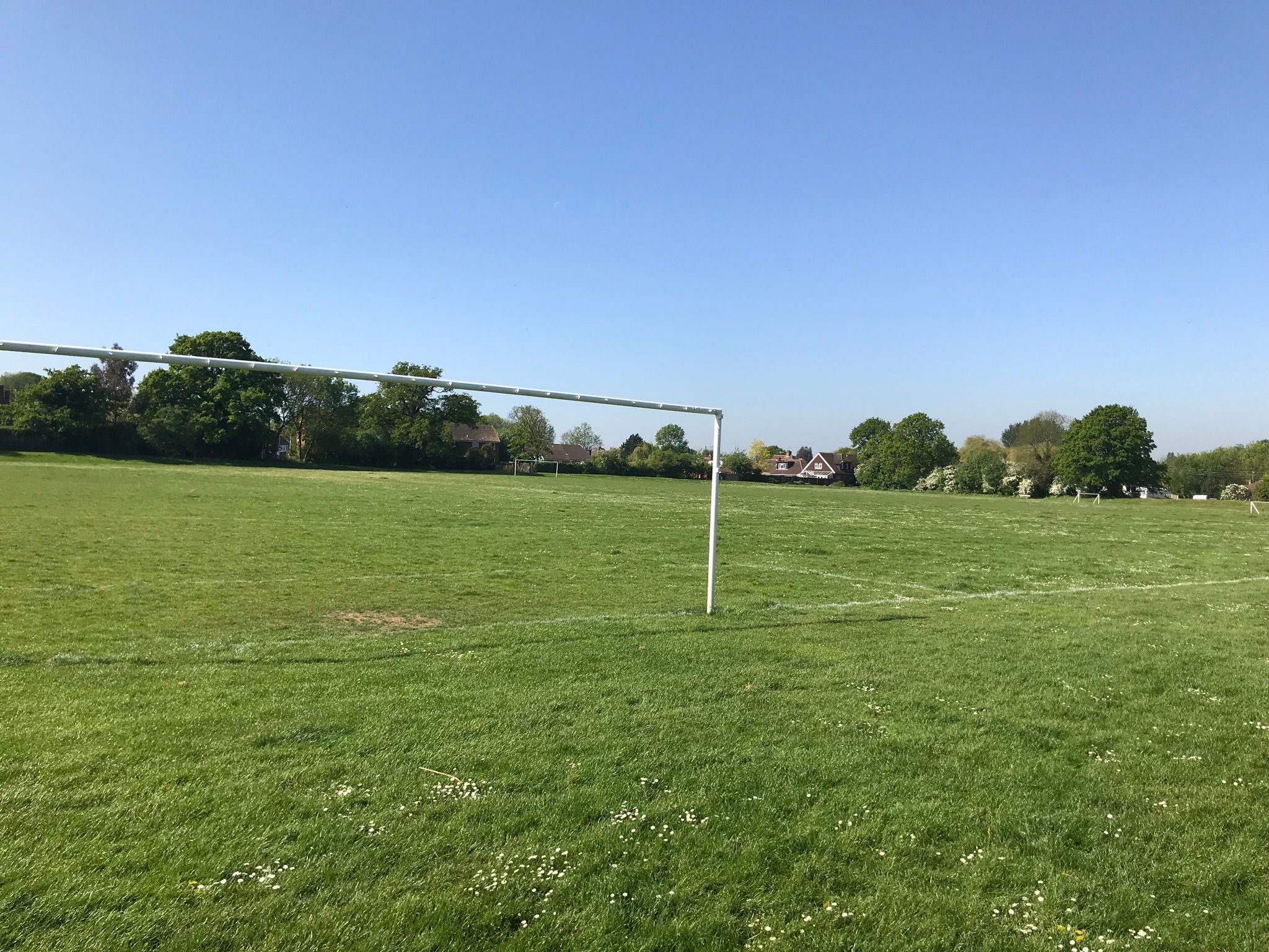 large playing fields and football pitches.