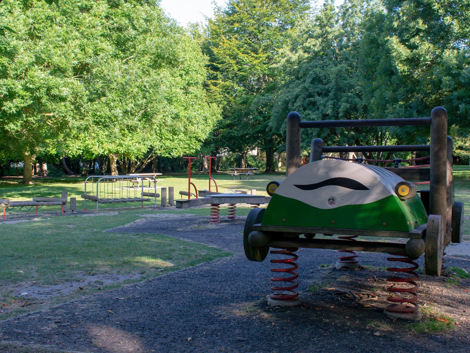 Safari jeep and springy play equipment outside the fort at Cobtree Manor Park