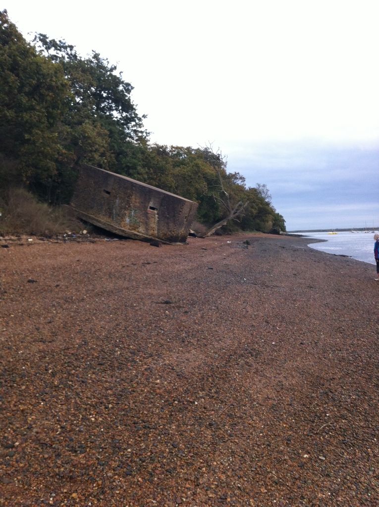  An old gun bunker that has slipped onto the beach