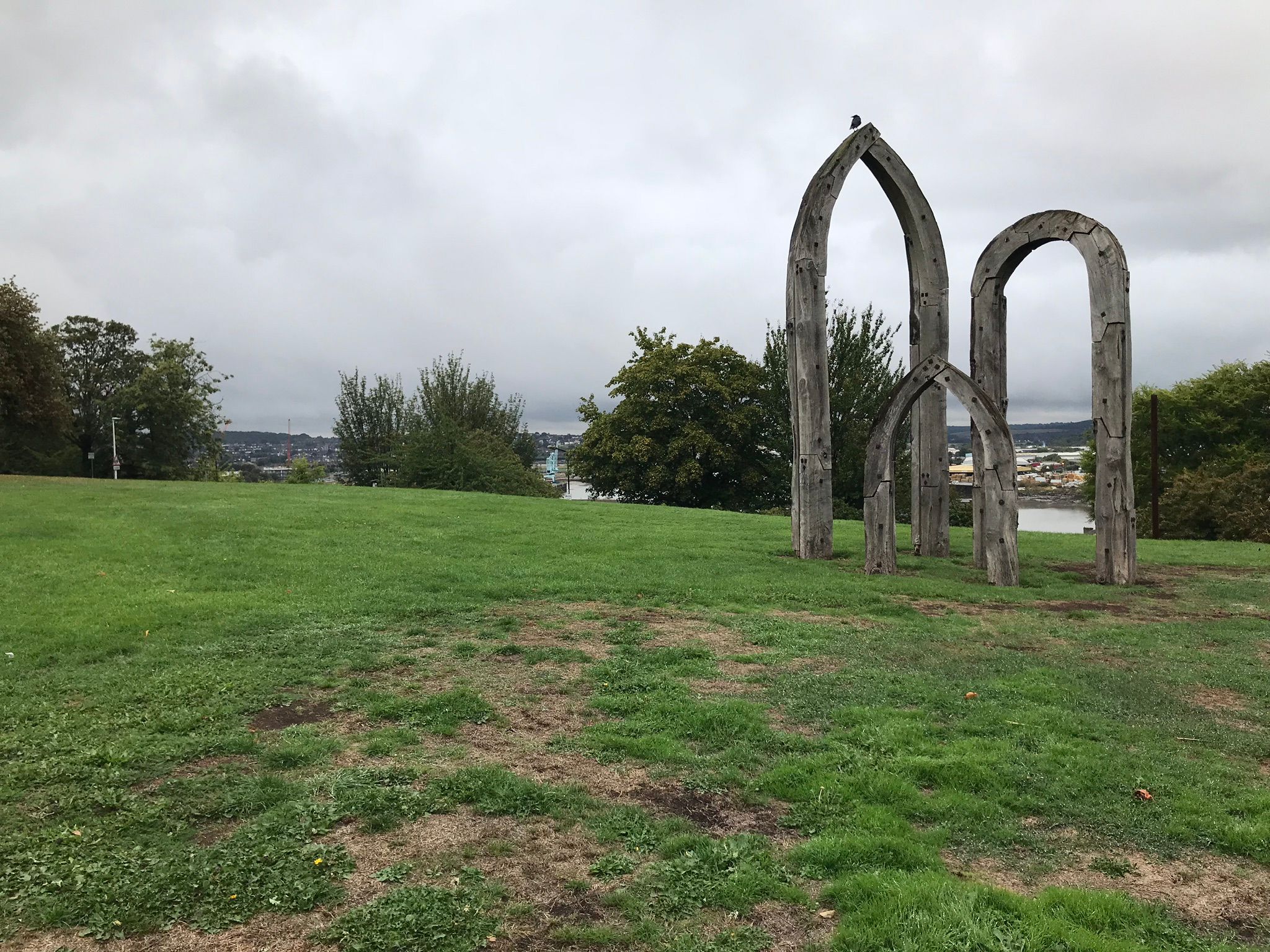 Large wooden arches looking out over Fort Pitt Hill and Victoria Gardens.