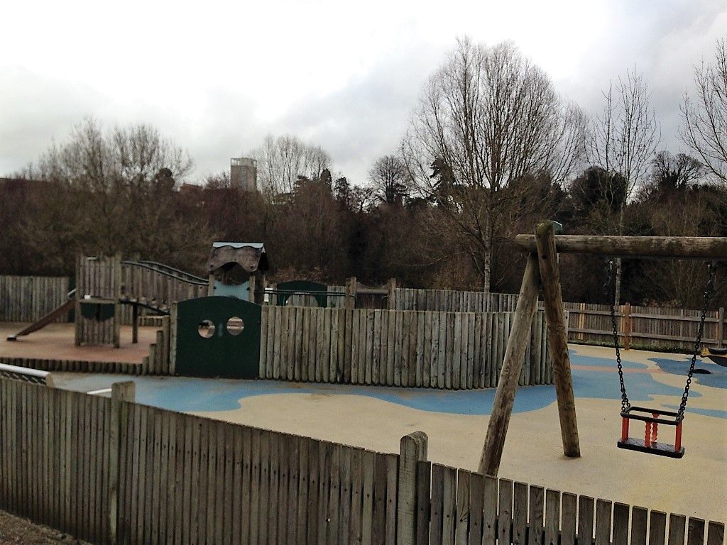 Smaller childrens play area with pirate theme, swings and sandpit